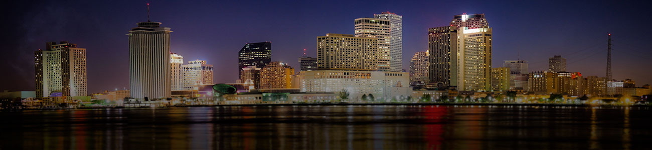 Downtown New Orleans, Louisiana and the Mississippi River at twilight